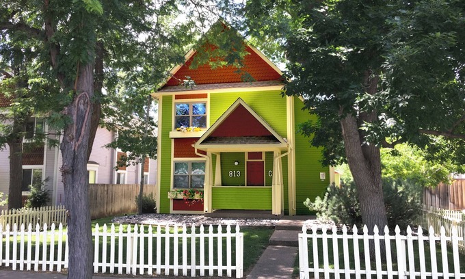 University Park Apartment | Boutique Studio Apartment Hotel across from CSU in Old Town Fort Collins! Light filled space that will transport and capture your heart. Curl up and read a book, let your mind wander from your private balcony as the giant oak tree blows in the breeze