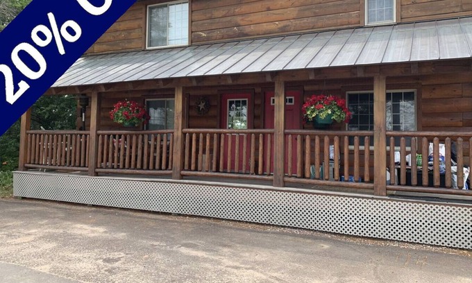 Arbor Vitae House | Brandy Old Fashion is situated on the beautiful Brady Lake!