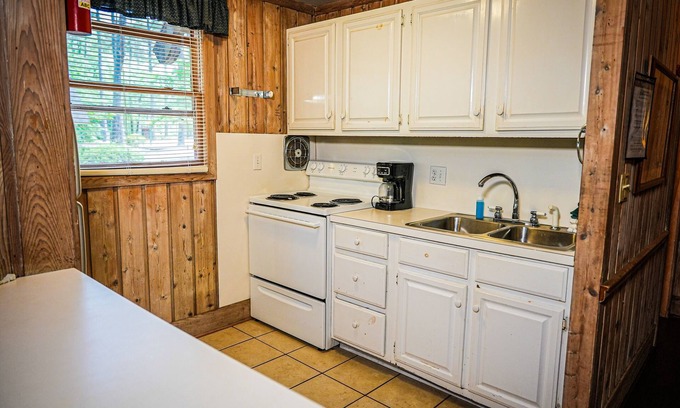 Pine Mountain Ski Chalet | Breathtaking view of Lake Innsbruck right from your own screened in porch.