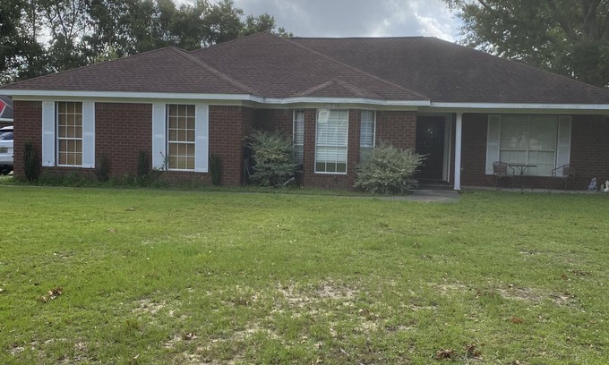 Foley House | Brick home in a quiet quaint neighborhood. Just minutes off the beach express.