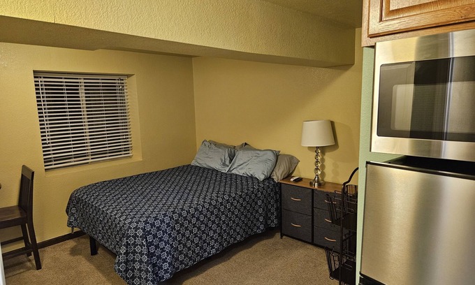 Walnut Grove Apartment | Bright and private basement studio with full laundry in rental.