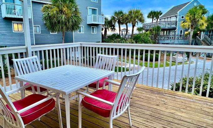 Port St. Joe House | Bright end unit across from pool -steps to beach ramp -beach chairs & cart incl.