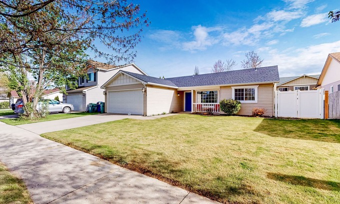 Coeur d'Alene House | Bright home with fenced yard & furnished patio for alfresco living