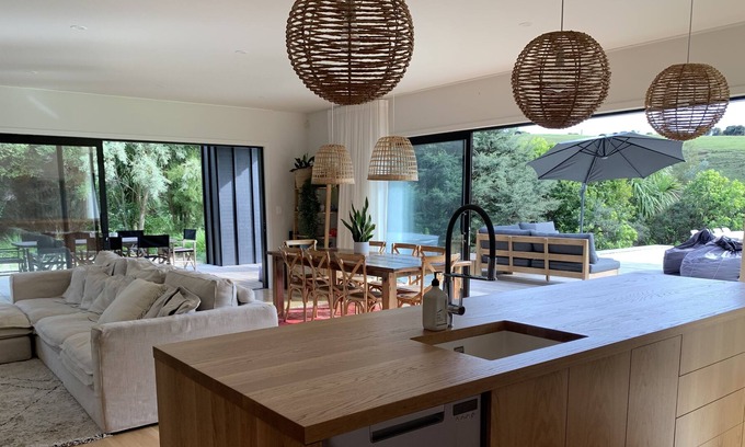 Raglan House | Bright Summer House near the beach with Spa