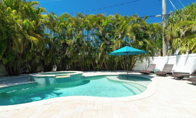 Holmes Beach House | Buddy’s Beach House Private Heated Pool and Spa- Pet Friendly