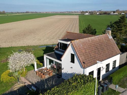 Cadzand-Bad Villa | Buitenhof, cosy villa with stunning views