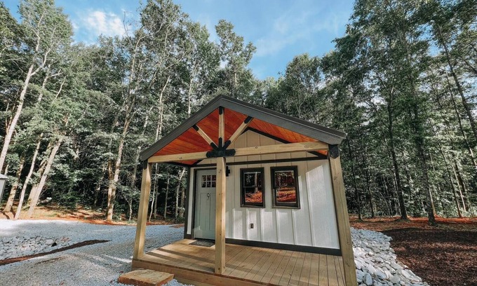 Hartwell RV Rental | Cabin #9: One king-size bed, a kitchenette, and a large gravel parking pad beside the cabin for easy boat or trailer storage.