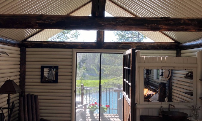 Kalispell Cabin | Cabin in the trees on a private pond with WiFi