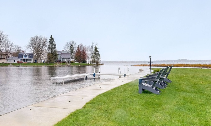 Cadillac Cottage | Cadillac Vacation Rental w/Dock on Lake Mitchell!