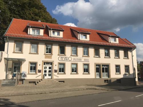 Hagen am Teuteburger Wald Hotel | CAESARO Hotel & Pizzeria - 20 Jahre Familienunternehmen
