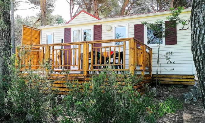 Castelnau-de-Guers House | Campsite Residential La Pinède * - Oceane COMFORT -2 bedrooms 27m2- *Clim, terrace, TV* 4 persons