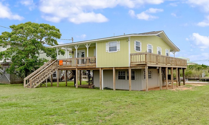 Royal Lagoons House | Canalside home with room for a boat - short walk from the beach