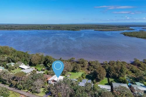 Culburra Beach House | Carramar - Fireplace - Absolute Waterfront
