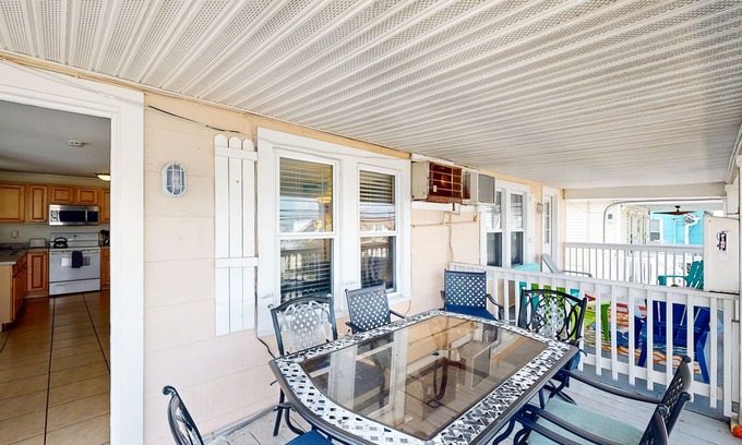 Ocean City Condo | Casa Rosa getaway in Parrot Bay walkable to beach with pool and WiFi - dog OK