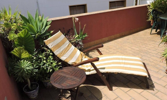 San Bartolome House | Casa Sevillana with Open Terrace, Balcony, Air Conditioning, Heating and Wi-Fi
