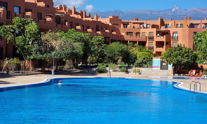 Granadilla de Abona Apartment | Casa Soleada close to sea + beach, 2 pools, terrace, sea views,TV, Wifi