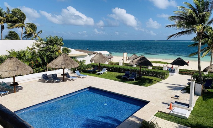 Puerto Morelos Condo | Casita Blanca gem overlooking a gorgeous pool and the Caribbean Sea!