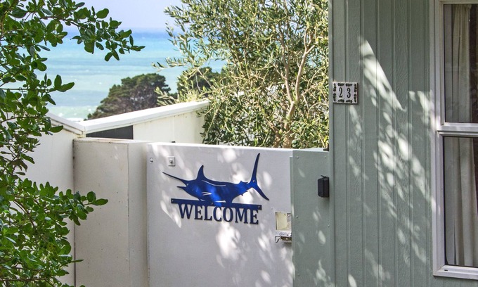 Castlepoint House | Castlepoint - Private family beach home with stunning views capturing the sun.