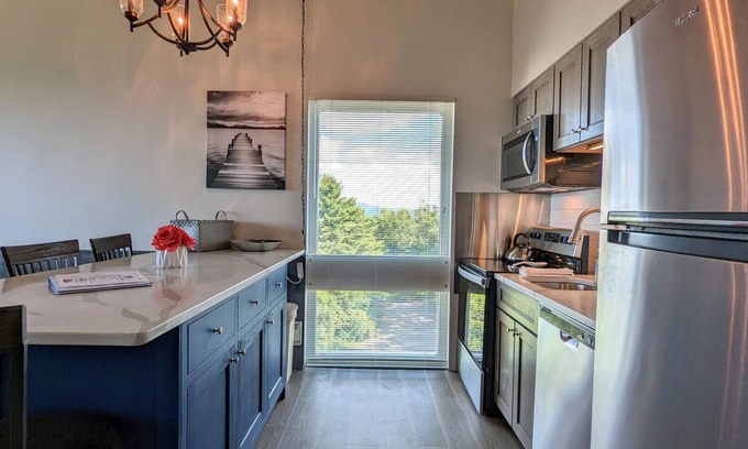 Weirs Beach Condo | Cedar Lodge 408. 1 edroom condo with spectacular views of Winnipesaukee!