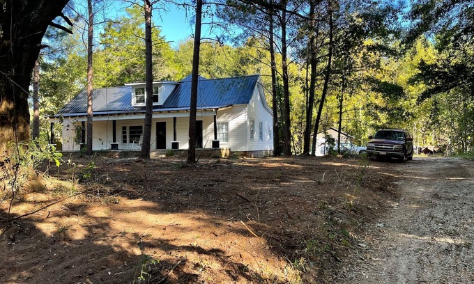Six Mile Other | Century Farmhouse on 20 acres with streams and trails