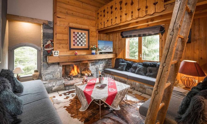 Meribel Village Ski Chalet | Chalet, 300m from ski slopes, view ski slopes, fitness, sauna, terrace, balcony, fireplace or stove