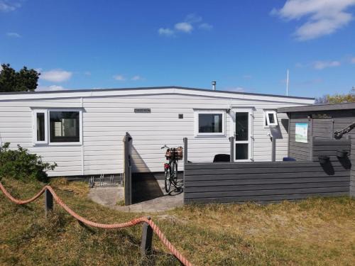 Buren Ski Chalet | Chalet T12 op Ameland inclusief Fietsen, Zee en Strand op loopafstand!