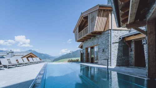 Kaprun Ski Chalet | CHALET VILLAGE ZAGLGUT Wellness & Views with Summer Card Included
