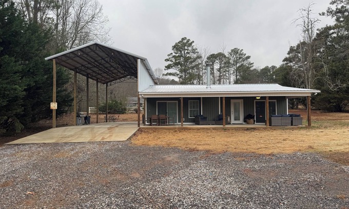 Guntersville Cabin | Charming 2-bed 2-bath cabin with views of Lake Guntersville from every room.