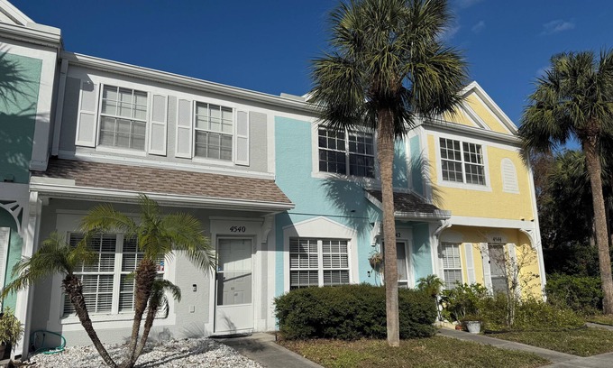 Peridia Country Club House | Charming 2-bedroom Key West style townhome with pool! Lakefront Serenity