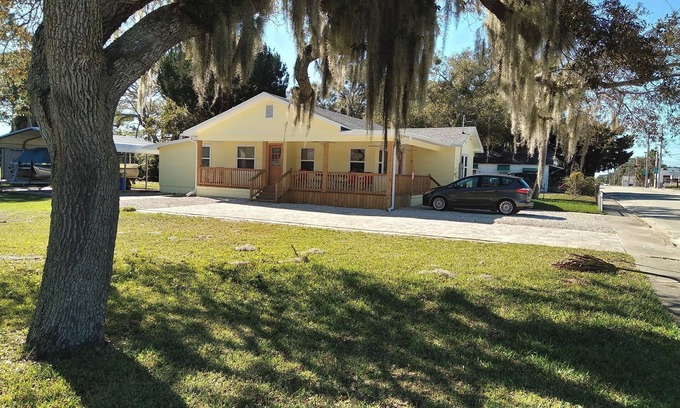 Edgewater House | Charming 3 bedroom 2 bath home w/wraparound veranda on one acre of land.