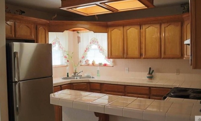 Brownsville House | Charming 3-bedroom house on over half acre lot