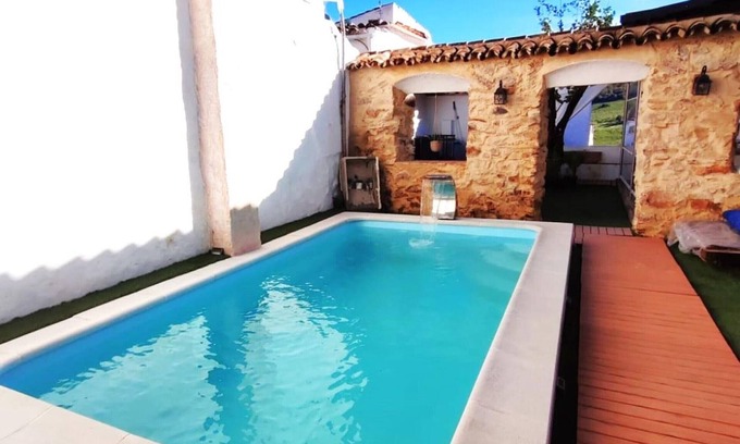 El Colmenar Cottage | Charming 4-Bedroom House with Shared Pool in Benarrabá, Spain