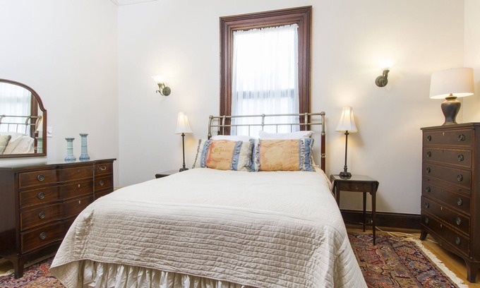 Fifth Ward Apartment | Charming apartment with 12 foot ceilings, fireplaces, and lots of sunshine.