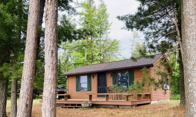 Rapid City Cabin | Charming Cabin on Elk Lake - Private Beach and Glorious Fall Colors!