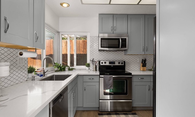 Claremont House | Charming Claremont home near parks and shopping, with open layout and large lot.