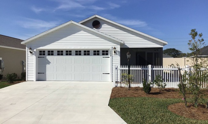 Wildwood Villa | Charming Corner Home w/Electric Golf Cart, BBQ Grill, & Stylish Comforts