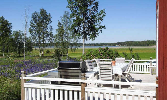 Kristinehamn House | Charming cottage with fireplace and lake view.