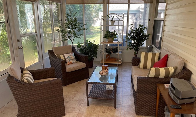 Lady Lake House | Charming Retreat with Lanai & Preserve Views, Golf Cart Included!