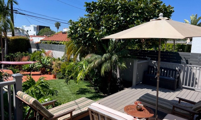 Mid City House | Charming Spanish Bungalow w/lush enclosed yard and back deck