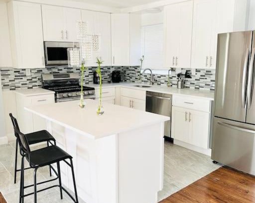 Elmont Apartment | Cheerful 4-bedroom home with free parking