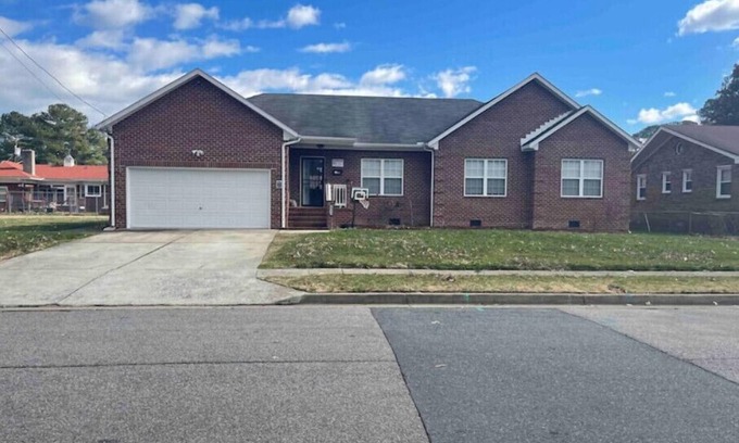 Norfolk House | Cheerful 4-BR Brick ranch home with a fireplacen