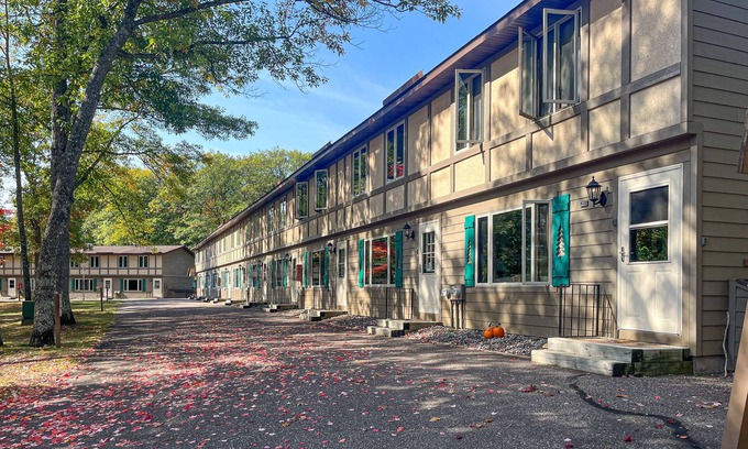 Eagle River Condo | Cheerful Condo w/Private Patio, Shared Tennis, Basketball, and Game Room