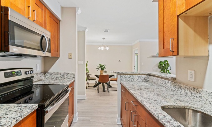 Lindbergh Condo | Chic 2bdr/2bath Urban Retreat - ATL Prime Location with free parking