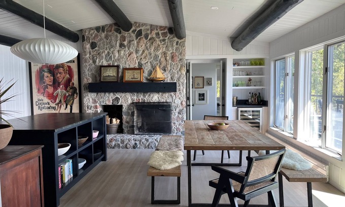 Northport Cottage | Chic log home, styled with flair, updated with modern amenities.