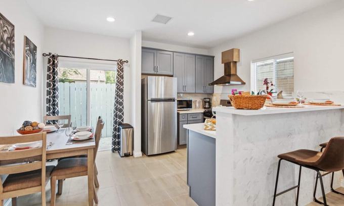 Covina House | City Vista Hideaway: Spacious 2-story back house. Relax with a 65” Smart TV, Unwind on the Balcony,