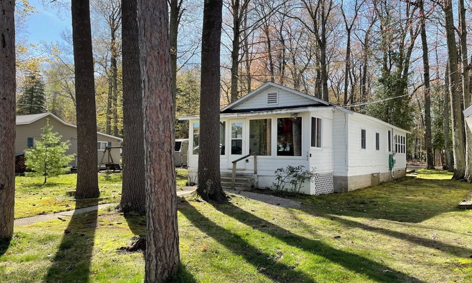 Tawas City House | Classic and Affordable Lake Home, WWII Display, Canoe, Deck, Quiet Neighborhood