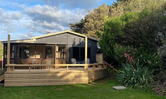 Waitarere Beach House | Classic bach just across the road from the Beach!
