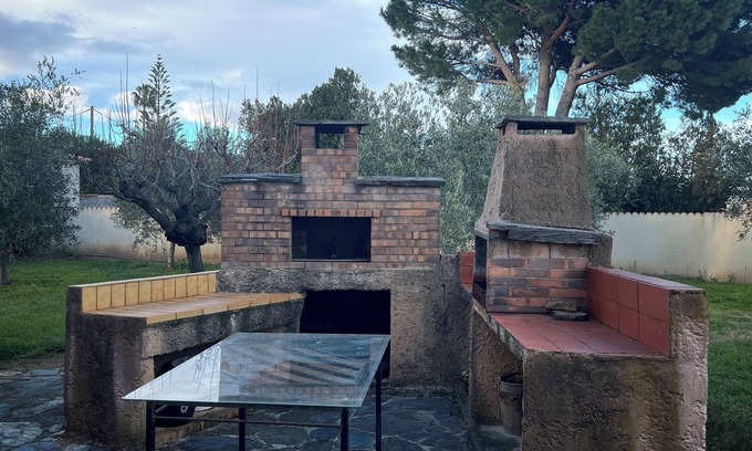 Lucciana House | Classic elegance and timeless charm: Maison de Caractère with garden