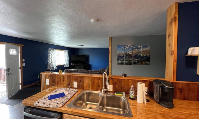 Sand Lake House | Close to airport cozy cabin style home sleeps 6