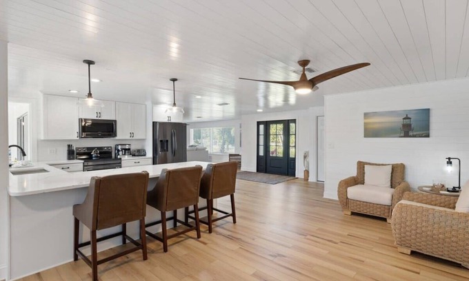 Shell Harbor House | Coastal Cottage on Canal, East End with Pool